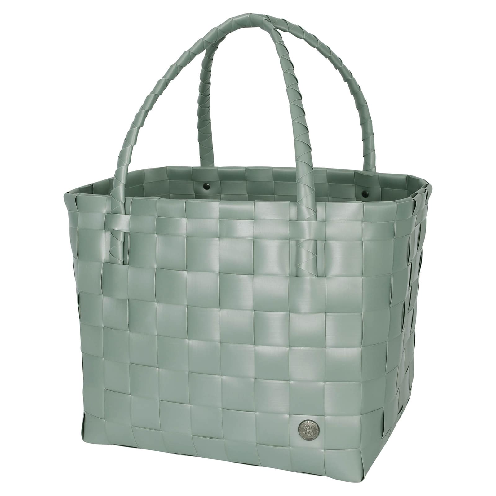 Der Paris Shopper in sage green ist ein Einkaufskorb geflochten aus recyceltem Kunststoff in einem pastellgrünen Farbton.
