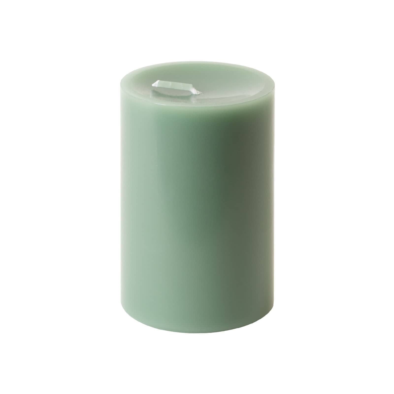 Die Stumpenkerze 8x12cm linde von Engels Kerzen hat eine pastellgrüne Farbe.
